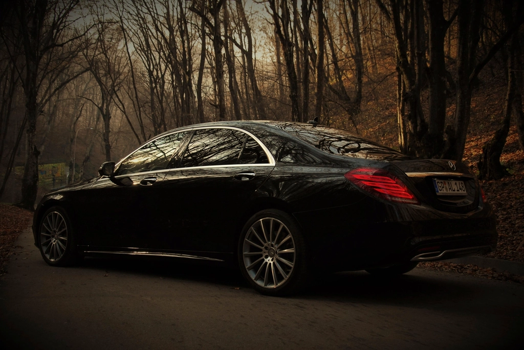 Fleet of black executive chauffeur vehicles managed on the GMH operations dashboard